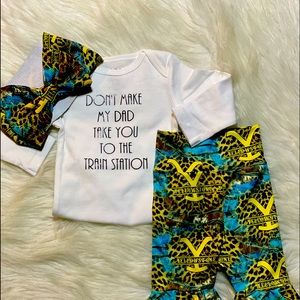 Handmade Yellowstone bell bottoms with matching bow and onesie.